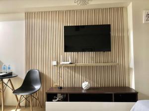 TV a/nebo společenská místnost v ubytování Avida Towers Davao + 6 fotografií
