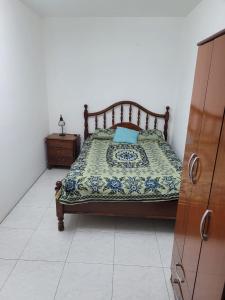 En eller flere senge i et værelse på Departamento pleno centro