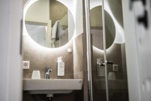 Koupelna v ubytování ViertelGlanz - Smart-TV, stilvoll & citynah wohnen