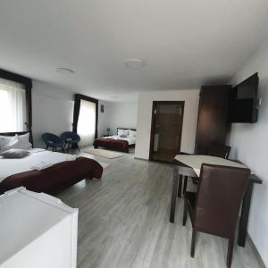Postel nebo postele na pokoji v ubytování Casa HAPPY + 3 fotografie