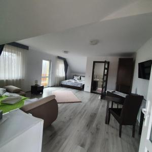 Postel nebo postele na pokoji v ubytování Casa HAPPY