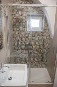 a bathroom with a shower and a sink at La Magnolia in Centola +13 photos
