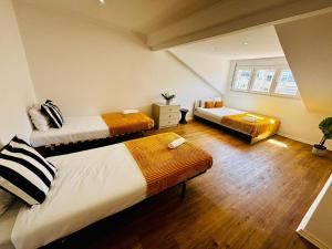 Ένα ή περισσότερα κρεβάτια σε δωμάτιο στο Luxury rooms ideal for tourists, ideal to visit Lisbon! +37 φωτογραφίες