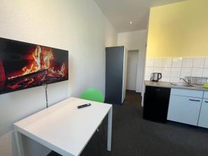 MonteurzimmerKING Leipzig-West 주방 또는 간이 주방 사진 24개 이상