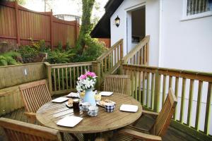 Balkón nebo terasa v ubytování Langland Corner Lodge