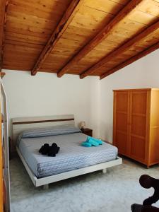 Postel nebo postele na pokoji v ubytování Dimora Veronica + 17 fotografií