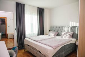 Postel nebo postele na pokoji v ubytování Villa Marco Polo + 19 fotografií