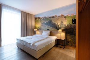 Ένα ή περισσότερα κρεβάτια σε δωμάτιο στο Hotel Stainzerhof