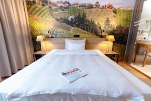Ένα ή περισσότερα κρεβάτια σε δωμάτιο στο Hotel Stainzerhof