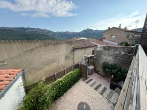 a view of a building with a retaining wall at Somianatura - Casa Rural Capafonts in Capafons