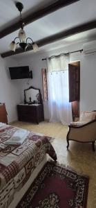 TV a/nebo společenská místnost v ubytování La Casa de la Abuela