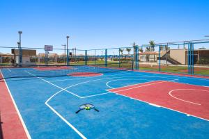 a basketball court with a ball on the court at Pickalbatros White Beach Resort - Hurghada in Hurghada