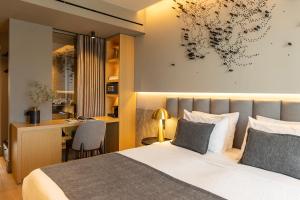 Posteľ alebo postele v izbe v ubytovaní Heritage Hill Hotel