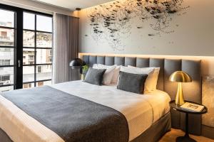 Posteľ alebo postele v izbe v ubytovaní Heritage Hill Hotel