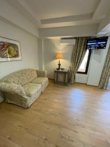 Posezení v ubytování Great Greece Le Convivial Suites
