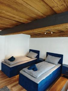 En eller flere senge i et værelse på Design-Apartment in Forchheim