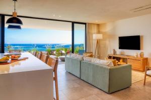 Μια τηλεόραση ή/και κέντρο ψυχαγωγίας στο Domaine d'Anbalaba - Baie du Cap - Ile Maurice