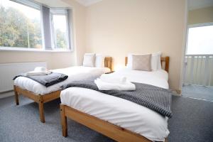 Katil atau katil-katil dalam bilik di Parkview - Spacious 3 Bed - Parking - WIFI