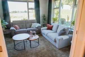 Χώρος καθιστικού στο Luxe vakantie woning Warnstee