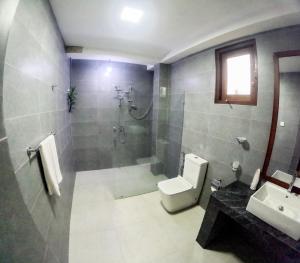 Ένα μπάνιο στο Mollusca Beach Villa