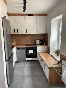 Η κουζίνα ή μικρή κουζίνα στο Apartament Zoya