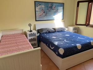 Ένα ή περισσότερα κρεβάτια σε δωμάτιο στο Villetta - Prestige Exclusive