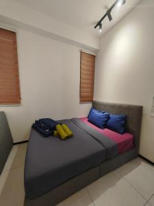 Postel nebo postele na pokoji v ubytování Seaview Urban suites Georgetown @Penang