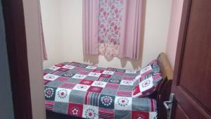 Postel nebo postele na pokoji v ubytování Appartement Fitahiana famille