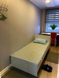 Ένα ή περισσότερα κρεβάτια σε δωμάτιο στο Suu Hostel Downtown