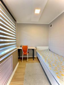 Ένα ή περισσότερα κρεβάτια σε δωμάτιο στο Suu Hostel Downtown