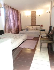 Postel nebo postele na pokoji v ubytování Samaya