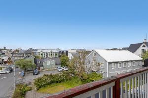 a view of a town from a balcony at Berg Apartments in Reykjavík