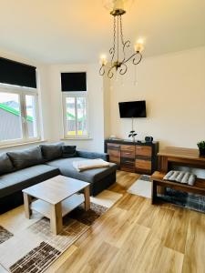 Χώρος καθιστικού στο Gemütliches Altbauapartment II +2 φωτογραφίες