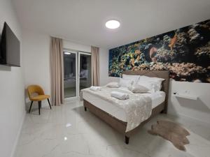 Ένα ή περισσότερα κρεβάτια σε δωμάτιο στο New villa Angelo 2025, family and pet friendly +52 φωτογραφίες