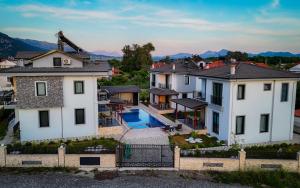 an aerial view of a house with a swimming pool at MSD Konakları in Koycegiz
