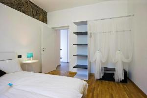 Postel nebo postele na pokoji v ubytování Residence alle Ville + 136 fotografií