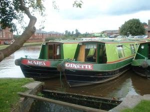 a boat that is docked in the water at Stone - Boat - Sleeps 2 - Pet Friiendly- 85ws in Stone