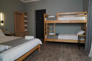 Postel nebo postele na pokoji v ubytování Luni
