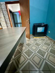 TV a/nebo společenská místnost v ubytování Residence Elysa de Yaounde Messassi