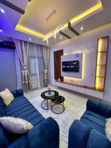 TV a/nebo společenská místnost v ubytování Residence Elysa de Yaounde Messassi