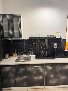 Kuchyň nebo kuchyňský kout v ubytování Strefa Solanki - Apartament