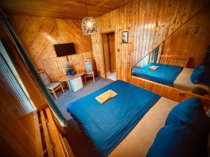 Postel nebo postele na pokoji v ubytování Motel Charlie