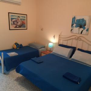 Posteľ alebo postele v izbe v ubytovaní Casa Susanna