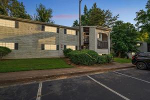 a car parked in front of a building at Kenridge Apartments 635 I Comfy 2 Bed 2 Bath in Decatur