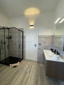 a bathroom with a shower and a sink at B&B Magiulsà in Siniscola +24 photos