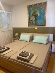 Postel nebo postele na pokoji v ubytování DalmaBlu