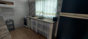 Køkken eller tekøkken på Casa, Espaço amplo Natureza & Praia