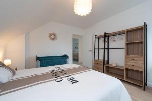 Postel nebo postele na pokoji v ubytování Family Prince - 8 personnes