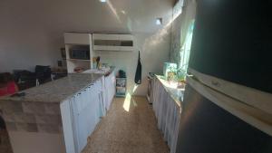 Køkken eller tekøkken på Casa, Espaço amplo Natureza & Praia