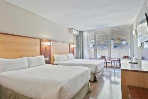 Katil atau katil-katil dalam bilik di Hotel Best Andorra Center